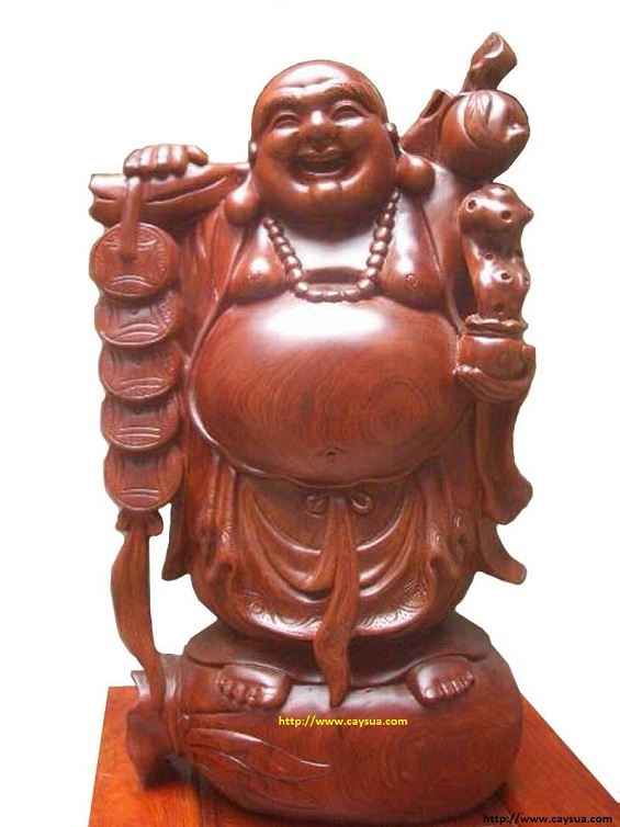 Tượng phật Di Lặc được làm từ gỗ cây sưa đỏ Tượng phật Di Lặc được làm từ gỗ cây sưa đỏ